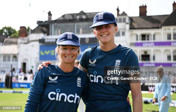 Danni Wyatt and Lauren Filer of England pose after being presented with their Test Caps ahead of day one of the LV= Insurance Women's Ashes Test...