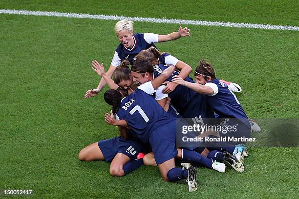 The United States celebrates the first half goal by Carli Lloyd of United States against Japan during the Women's Football gold medal match on Day 13...