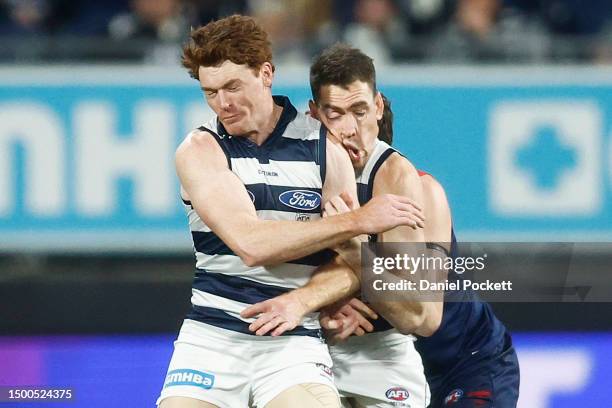 Gary Rohan of the Cats makes accidental contact with Jeremy Cameron of the Cats during the round 15 AFL match between Geelong Cats and Melbourne...