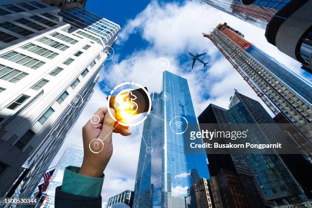 business man hand holding credit card in the city - interview icon stock pictures, royalty-free photos & images