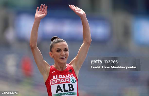 Luiza Gega of Albania celebrates after crossing the finish line in the Women's 3000m Steeplechase - Div. 3 during day three of the European Games...