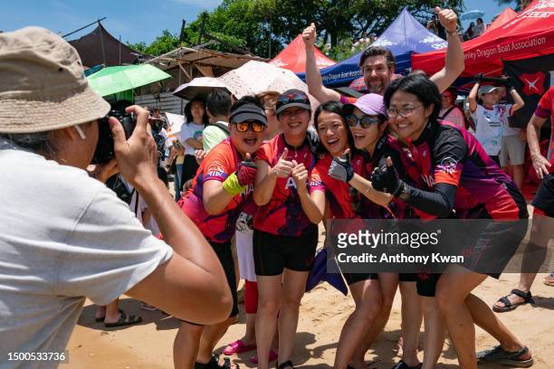 Participants poses for a photograph during the Dragon Boat Festival on June 22, 2023 in Hong Kong, China. The Dragon Boat Festival is a significant...