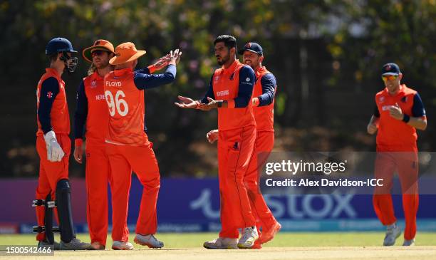 Aryan Dutt of the Netherlands celebrates the wicket of Jessy Singh of USA during the ICC Men's Cricket World Cup Qualifier Zimbabwe 2023 match...