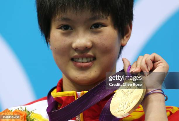 Gold medallist Ruolin Chen of China poses on the podium during the medal ceremony for the Women's 10m Platform Diving Final on Day 13 of the London...