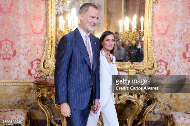 King Felipe VI of Spain and Queen Letizia of Spain meet the members of the "Princesa De Asturias" Foundation at Royal Palace on June 22, 2023 in...