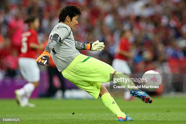 Goalkeeper Miho Fukumoto of Japan kicks the ball while taking on the United States in the first half during the Women's Football gold medal match on...