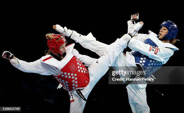 Suvi Mikkonen of Finland competes against Diana Lopez of the United States during the Women's -57kg Taekwondo repechage on Day 13 of the London 2012...