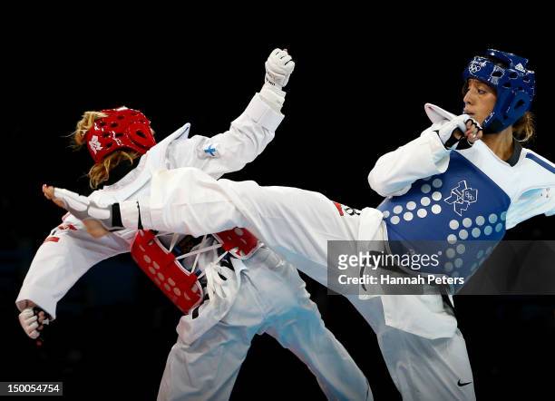 Suvi Mikkonen of Finland competes against Diana Lopez of the United States during the Women's -57kg Taekwondo repechage on Day 13 of the London 2012...