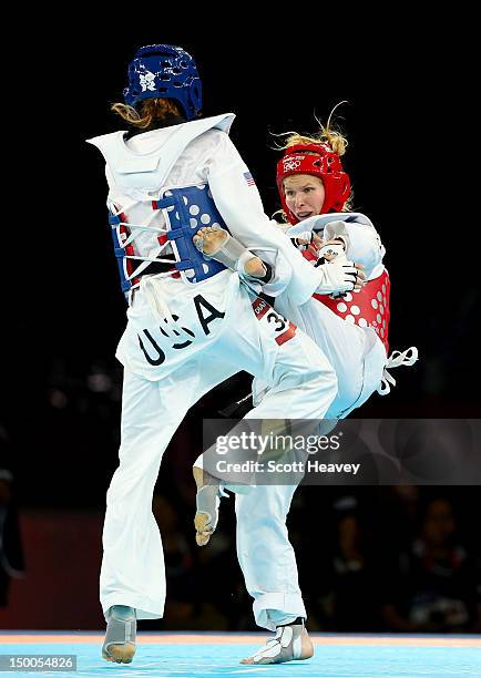 Suvi Mikkonen of Finland competes against Diana Lopez of the United States during the Women's -57kg Taekwondo repechage on Day 13 of the London 2012...