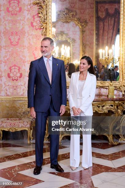 King Felipe VI of Spain and Queen Letizia of Spain meet the members of the "Princesa De Asturias" Foundation at Royal Palace on June 22, 2023 in...