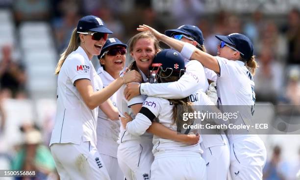 Lauren Filer of England celebrates the wicket of Beth Mooney of Australia for their maiden test wicket during day one of the LV= Insurance Women's...