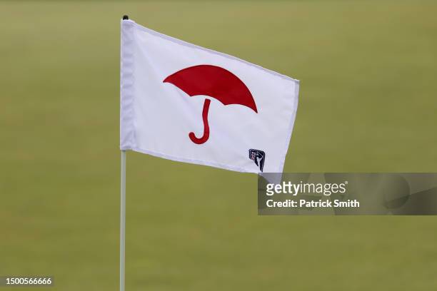Flag blows in the breeze on the first green during the first round of the Travelers Championship at TPC River Highlands on June 22, 2023 in Cromwell,...