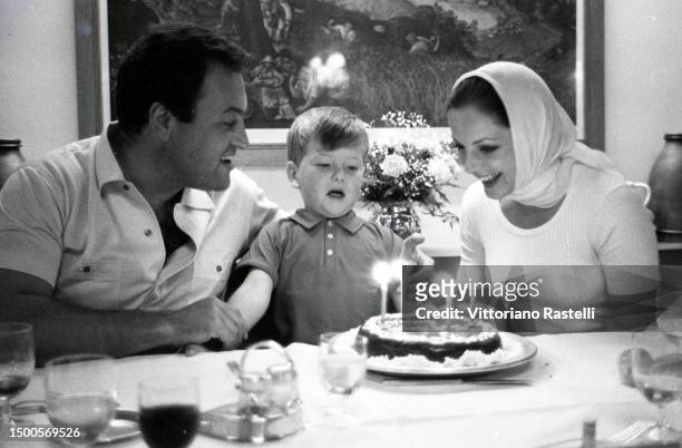 Udine, Italy, on July 8 the Italian actress Virna Lisi, with her husband Franco Pesci celebrate the birthday of his son Corrado.