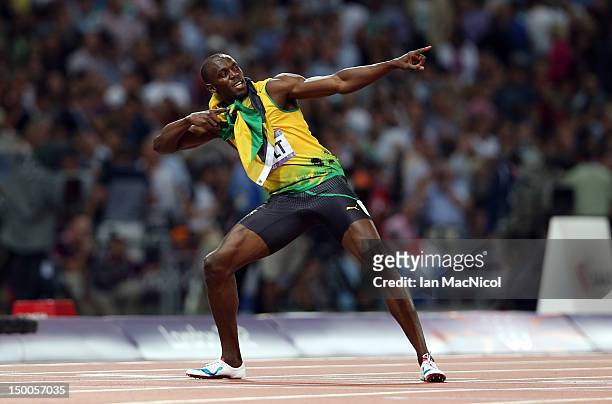 Usain Bolt of Jamaica celebrates winning gold during the Men's 200m Final on Day 13 of the London 2012 Olympic Games at Olympic Stadium on August 9,...