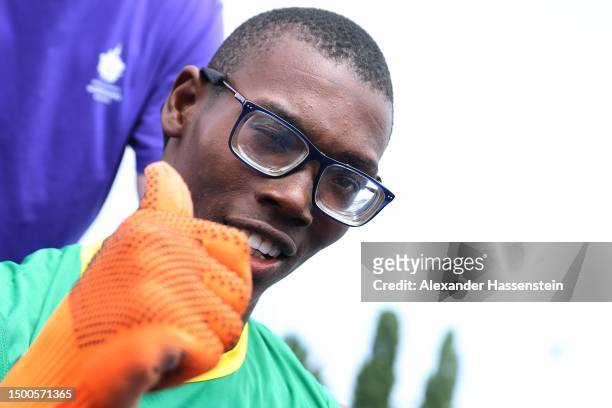 Kirk Wint of Jamaica reacts after finishing the 50m Men Final Plus at the Athletics Track and Field competition during day six of Special Olympics...