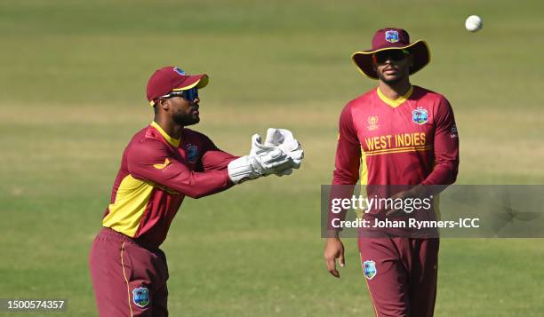 Shai Hope of West Indies gathers the ball during the ICC Men's Cricket World Cup Qualifier Zimbabwe 2023 match between the West Indies and Nepal at...