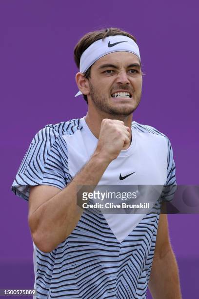 Taylor Fritz of United States celebrates a point against Adrian Mannarino of France during the Men's Singles Second Round match on Day Four of the...