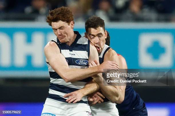 Gary Rohan of the Cats makes accidental contact with Jeremy Cameron of the Cats during the round 15 AFL match between Geelong Cats and Melbourne...