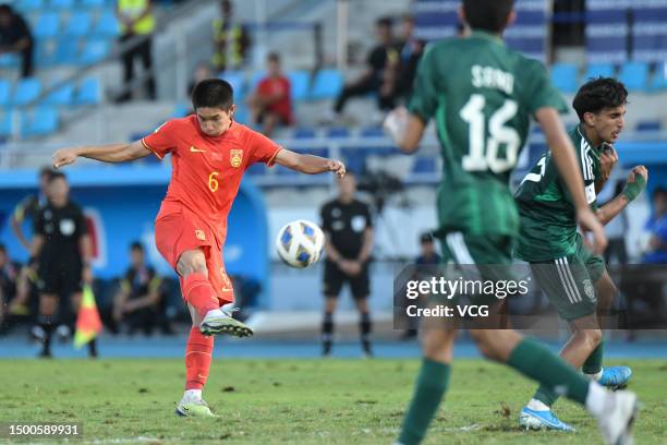 Qian Yuanfan of China kicks the ball during the 2023 AFC U17 Asian Cup group C match between China U17 and Saudi Arabia U17 at Chonburi UTA Stadium...