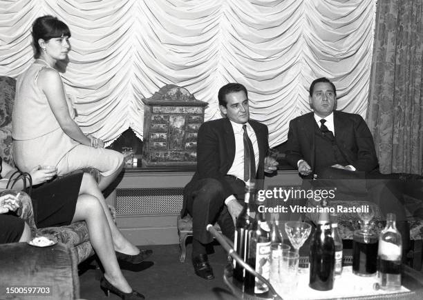 Party at the Gasman house, Rome, Italy, January 1965, the actors Alberto Sordi with Vittorio Gasman and Juliette Mayniel