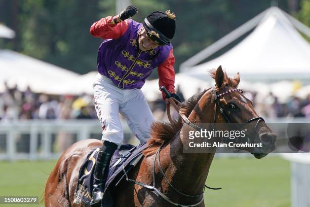 Tom Marquand celebrates after riding Desert Hero to win The King George V Stakes on day three during Royal Ascot 2023 at Ascot Racecourse on June 22,...