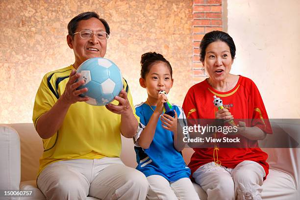 girl with her grandparents - asian cheerleaders stock-fotos und bilder