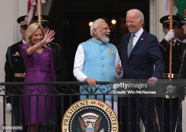 President Joe Biden, Indian Prime Minister Narendra Modi and first lady Jill Biden stand together during an arrival ceremony at the White House on...