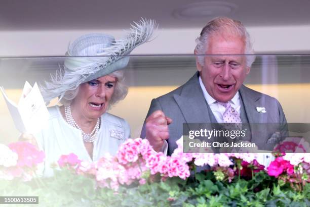 King Charles II and Queen Camilla watch their horse Desert Hero win as they attend day three of Royal Ascot 2023 at Ascot Racecourse on June 22, 2023...