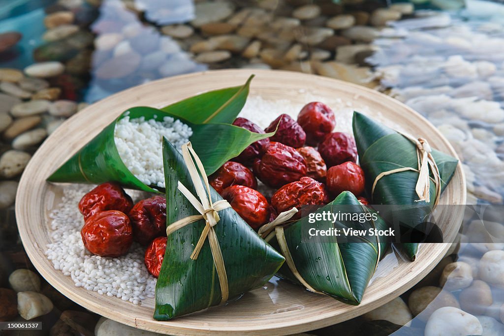 "Sticky rice dumplings wrapped in leaves,close up"