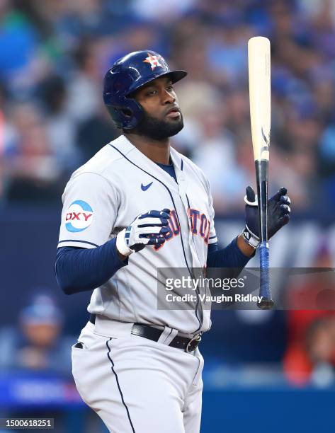 Yordan Alvarez of the Houston Astros reacts after striking out against the Toronto Blue Jays at Rogers Centre on June 06, 2023 in Toronto, Ontario,...