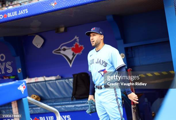 George Springer of the Toronto Blue Jays arrives in the dugout prior to a game against the Houston Astros at Rogers Centre on June 06, 2023 in...