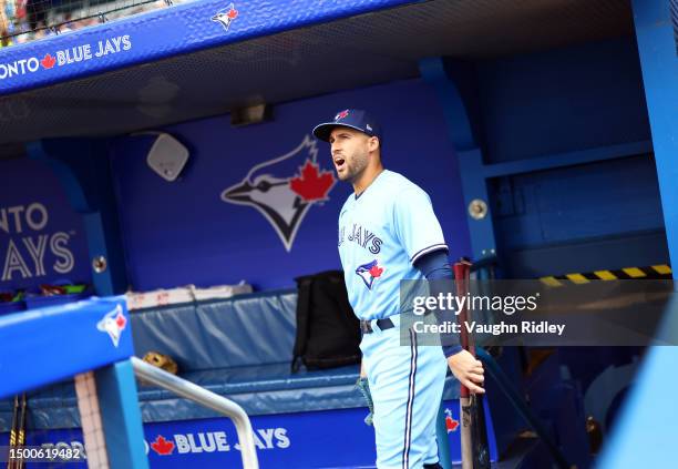 George Springer of the Toronto Blue Jays arrives in the dugout prior to a game against the Houston Astros at Rogers Centre on June 06, 2023 in...