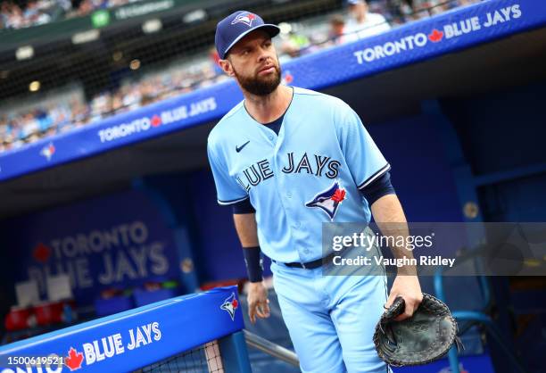 Brandon Belt of the Toronto Blue Jays runs onto the field prior to a game against the Houston Astros at Rogers Centre on June 06, 2023 in Toronto,...