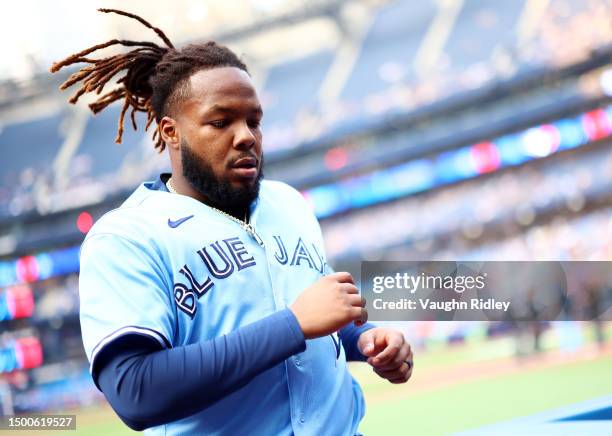 Vladimir Guerrero Jr. #27 of the Toronto Blue Jays walks to the dugout prior to a game against the Houston Astros at Rogers Centre on June 06, 2023...