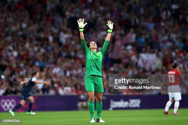 Hope Solo of the United States celebrates after defeating Japan by a score of 2-1 to win the Women's Football gold medal match on Day 13 of the...