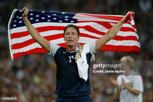 Abby Wambach of the United States celebrates after defeating Japan by a score of 2-1 to win the Women's Football gold medal match on Day 13 of the...