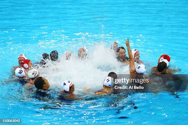 United States players celebrate winning the Women's Water Polo Gold Medal match between the United States and Spain on Day 13 of the London 2012...