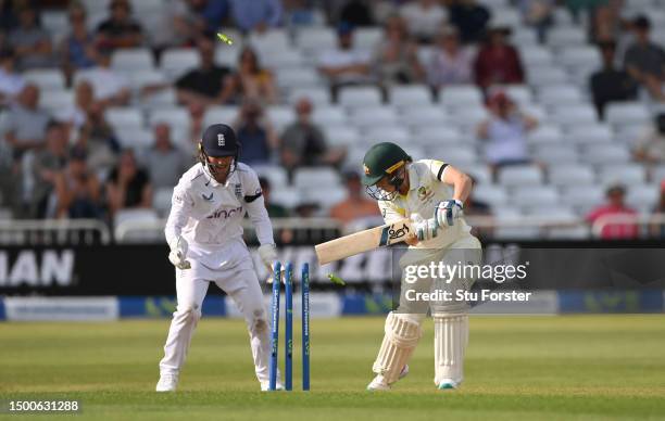 England wicket keeper Amy Jones reacts as Australia batter Alyssa Healy is bowled for 0 by Sophie Ecclestone during day one of the LV= Insurance...