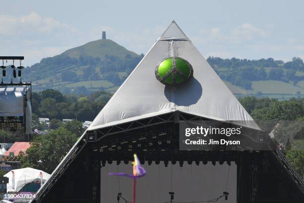 View of the Pyramid stage with Glastonbury Tor behind as final preparations are made during day 2 of Glastonbury Festival 2023 at Worthy Farm, Pilton...