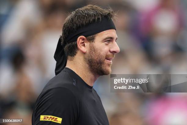 Juan Martin Del Potro of Argentina reacts against Marat Safin of Russia and David Ferrer of Spain on Day 1 of Hangzhou 2023 International Tennis...