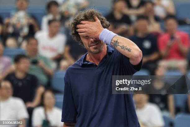 Marat Safin of Russia reacts against Carlos Moya of Spain and Juan Martin Del Potro of Argentina on Day 1 of Hangzhou 2023 International Tennis...