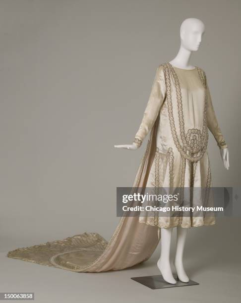 Lesbos wedding dress, 1925 . Silk satin, pearls, glass beads, metallic thread by Jeanne Lanvin.