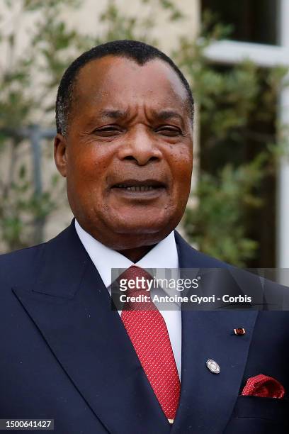 French President Emmanuel Macron greets Congolese President Denis Sassou Nguesso prior to their meeting at the Elysee Palace, on the sidelines of the...
