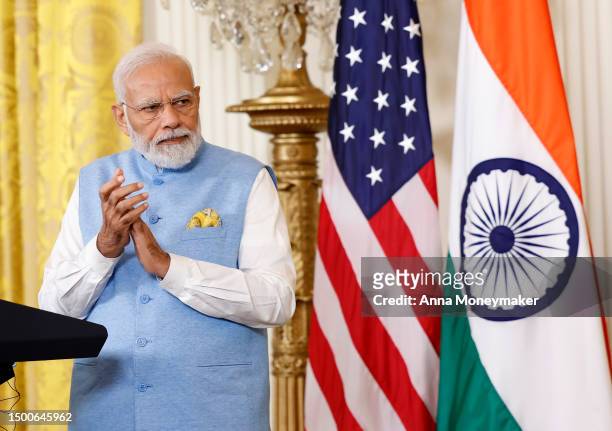 Indian Prime Minister Narendra Modi applauds during a joint press conference with U.S. President Joe Biden at the White House on June 22, 2023 in...