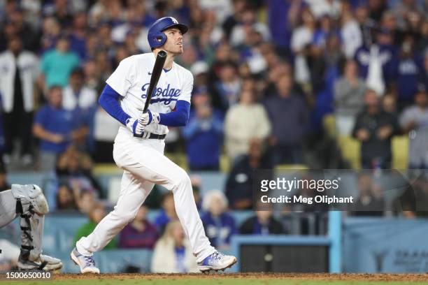 Freddie Freeman of the Los Angeles Dodgers watches his hit in the ninth inning against the San Francisco Giants at Dodger Stadium on June 16, 2023 in...