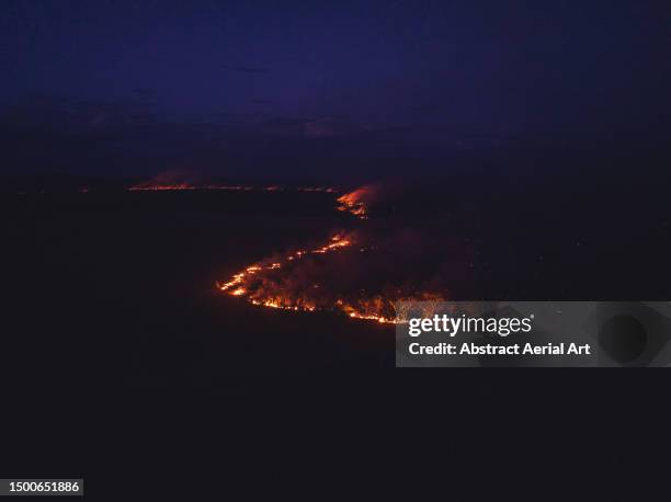 aerial image showing a wildfire at night, alice springs, northern territory, australia - dramatic landscape stock pictures, royalty-free photos & images