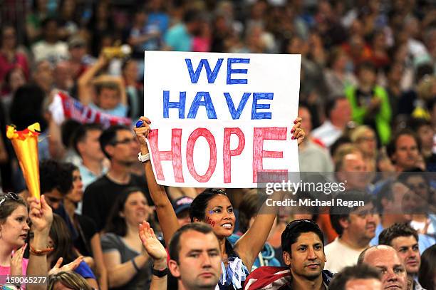 Fans hold up a sign saying 'We Have Hope' late in the second half while taking on Japan during the Women's Football gold medal match on Day 13 of the...