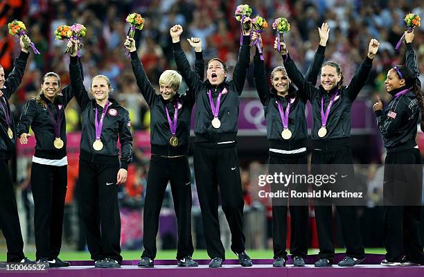 The United States stands on the podium with the the gold medal after defeating Japan by a score of 2-1 to win the Women's Football gold medal match...