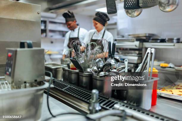 Cooking Staff 8,397 Restaurant Kitchen Staff Stock Photos, High-Res Pictures, and ...