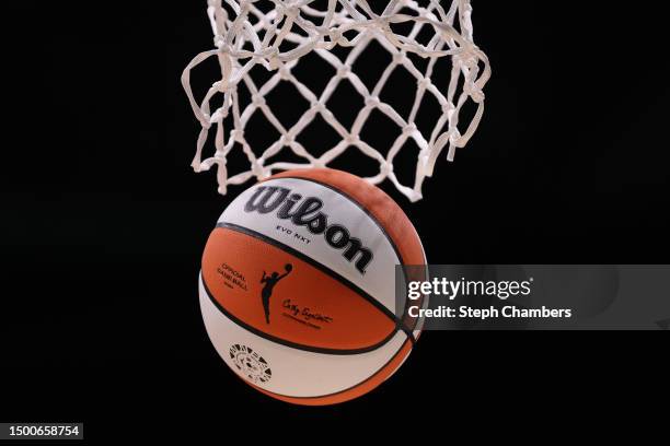 Detail of the WNBA logo is seen on a basketball during warmups between the Seattle Storm and the Connecticut Sun at Climate Pledge Arena on June 20,...